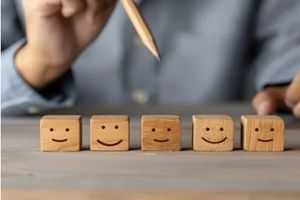 girl with multiple wooden emojies