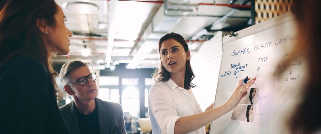 Marketing Manager explaining SEO to her team