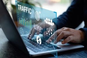 analyzing traffic data and website analytics on laptop, modern business and marketing concept