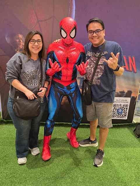 Phil Gonzales posing with Spiderman